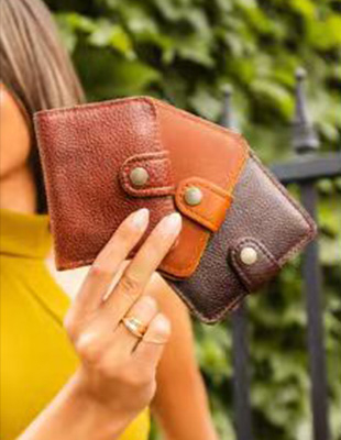 Carteras y bolsos portátiles para mujer